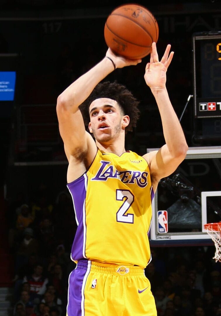 A man holding a basketball in his hand.